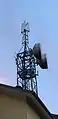 TIM Basisstation mit HSPA+ (2100 MHz, Antenne unten) und LTE (800 MHz, Antenne oben) in Mals