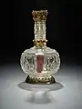 Bergkristallflasche aus geschliffenem Bergkristall mit Goldmonturen, fatimidisch 10./11. Jahrhundert, mit Goldfassungen Mitteldeutschland 12./14. Jahrhundert. Domschatz Halberstadt