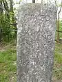 Grenzstein von Herzogtum Mailand im Ortsteil Santa Margherita (354&nbsp;m), im Hintergrund Schweizer Gebiet