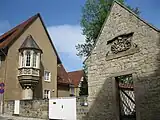 Spätgotischer Erker (1518) und Giebelwand