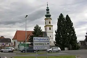 Ortseinfahrt und Pfarrkirche Feldkirchen bei Graz (2008)