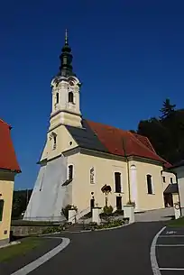 Katholische Pfarrkirche hl. Dionysius und Kirchhofin Wolfsberg im Schwarzautal