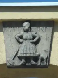 Reichenbach (Eulengeb.) - Zwei Reliefs: (l.) Uf Heem zu! (Auf dem Weg nach Hause) &nbsp;(r.) Komm mer ock! (Komm mir nur! (Mit dem Finger drohenb.))