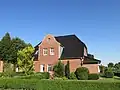 Renoviertes Pfarrhaus im Jahr 2006 mit zwei Mietwohnungen