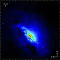 ESO: Infrarotaufnahme bei 2,2&nbsp;µm – das supermassive Schwarze Loch im Zentrum tritt hervor.