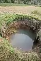 Ein Quellschwemmkegel aus der NNW-SSE Reihe in der Trockenzeit bei Niederntudorf.