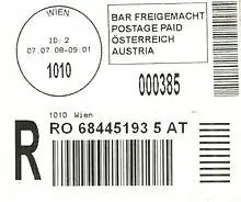 Gedruckter Poststempel mit Uhrzeitangabe und Einschreiben