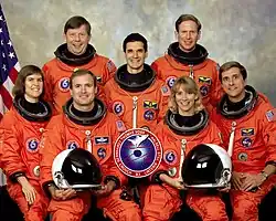v. l. n. r. Vorne: James Halsell, Susan Leigh Still-Kilrain; Mitte: Janice Voss, Greg Linteris, Donald Thomas; Hinten: Roger Crouch, Michael Gernhardt