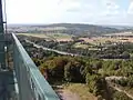 Blick über die BAB 2 nach Bad Eilsen am Harrl mit dem Kraftwerk Heyden rechts am Horizont