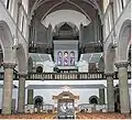 Orgelchor einer neuromanischen Kirche mit Prospekt der 1930er Jahre (St. Mariä Himmelfahrt, Bettemburg&nbsp;LU)