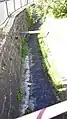 Wachwitzbach mit Ufermauern und gepflasterter Sohle