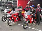 Winners Presentation 350&nbsp;cc Junior Classic Race – Ian Moore (9), Chris Palmer (2) & Chris Swallow (17) TT Grandstand  Tuesday 28 August 2012