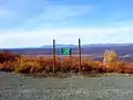 At 4,086 feet (1,245&nbsp;m), MacClaren summit is the highest point on the highway.