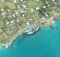 There does appear to be a small exit channel to the south of Sharks Hole but this was an unusually calm day.
